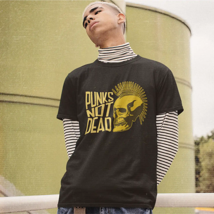 a male model wearing a black Sapienwear men's tshirt with the "punks not dead" graphic on the front side