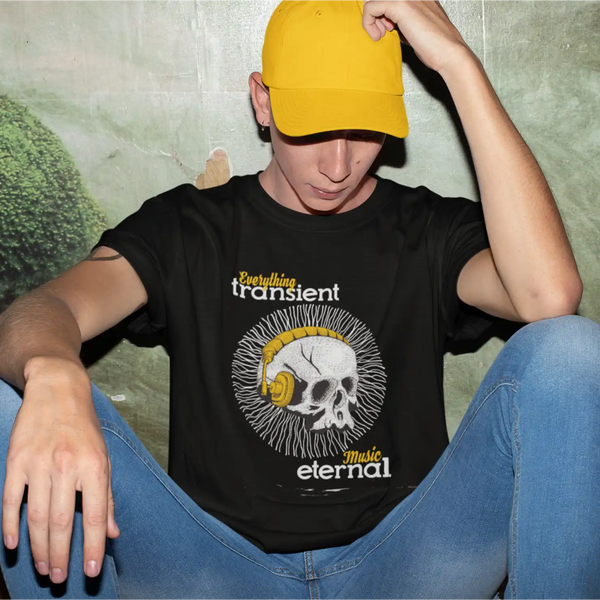 A male model wearing a black Sapienwear men's t-shirt with the "music eternal" graphic on the front side