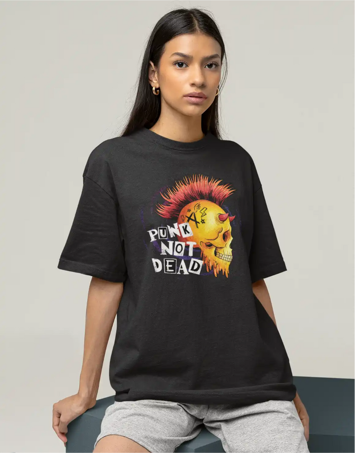 a model wearing a black Sapienwear women's oversized t-shirt with the punk not dead graphic in the front.