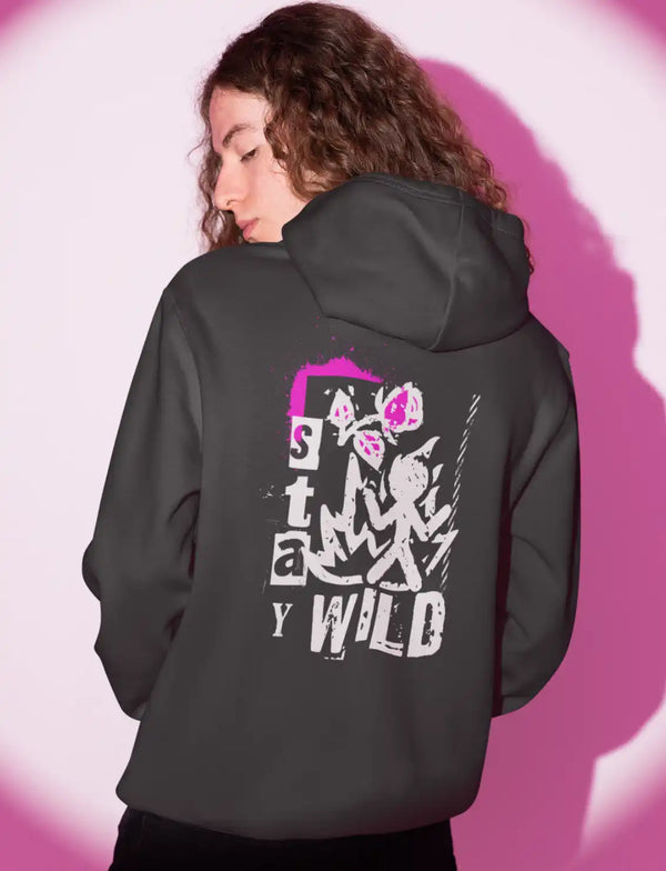 a male model wearing a black sapienwear hoodie with the stay wild design on the back side