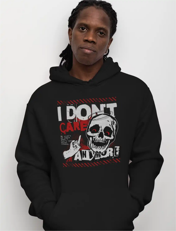 a male model wearing a black sapienwear men's hoodie with the skull design on the front side